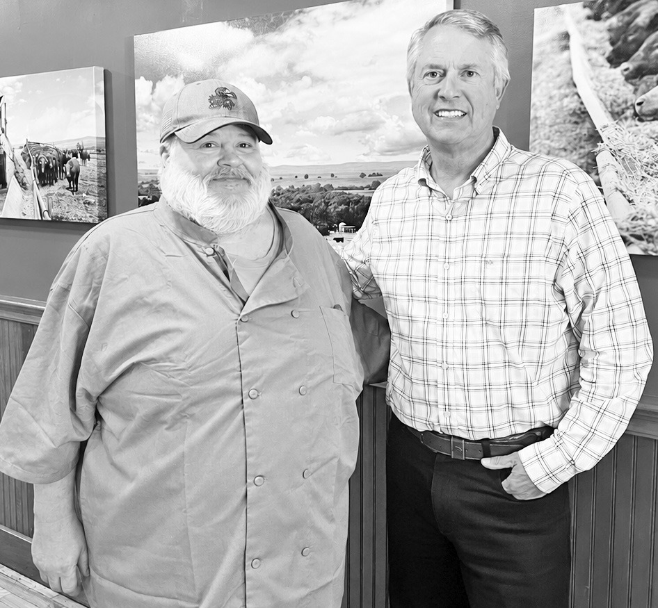 Hays House co-owner Randy Dickson (left) took time away from the kitchen to greet Senator Roger Marshall who stopped in town on Thursday, October 8, on his way to Manhattan, after campaign stops in Chase County.