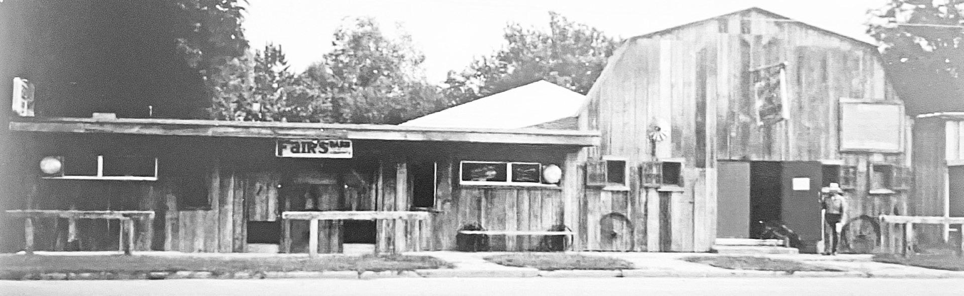 The above August. 13, 1992 photograph shows the Main Street facade of the property at 410 E. Main St. after the eastern and western portions had been connected.