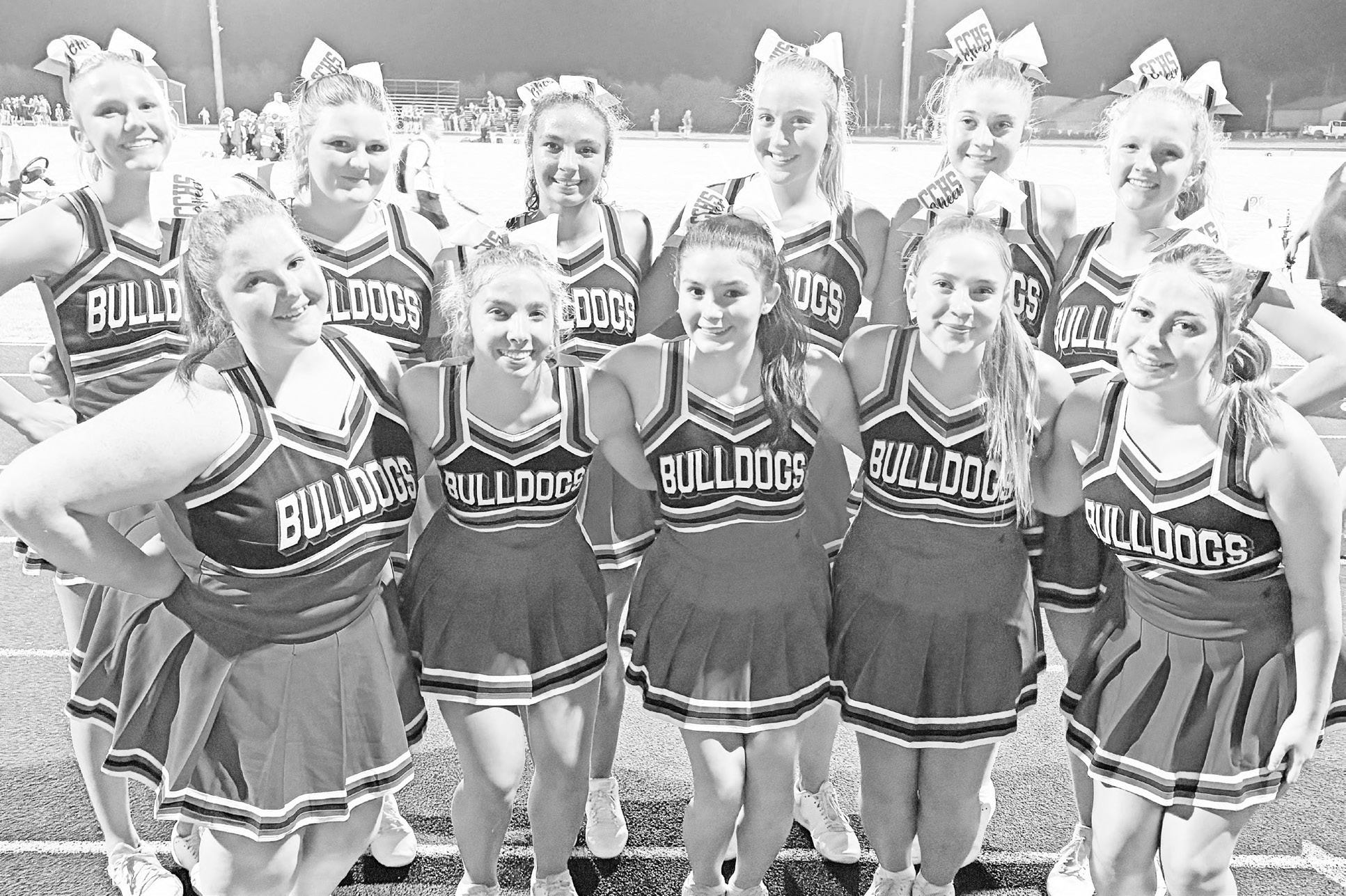 The Chase County High School cheerleaders have a lot to cheer about this season. The Bulldogs are 3-1 overall and 1-0 in district play. Pictured are back row (L to R): Eva Schlup, Jordan Green, Mena Lincoln, Isabella Murphy, Reese Myers and Annette Neff; front row: Bianca Jones, Alexys Miller, Avrianna Rodriguez, Brooke Wells and Kaydance Zirkel. (Photo: Stacia Barrett)