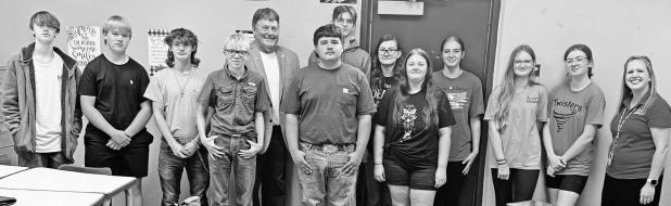 State Sen. Mike Argabright poses with the JAG-K class at Council Grove Junior Senior High School last week, after speaking with them about the importance of elections, the legislative process and leadership. Pictured left to right are: Colton Jones, Keegan Farr, Kyle Lybarger, Ronnie Mayer, Senator Argabright, Bayden Houts, Sam Parker (Behind Bayden), Megan Heldstab (back row), Addisyn Reynolds (front row), Bayleigh Yowell, Sierra Jones, Caidence Davis, Dani Sisson - JAG-K Career Specialist.