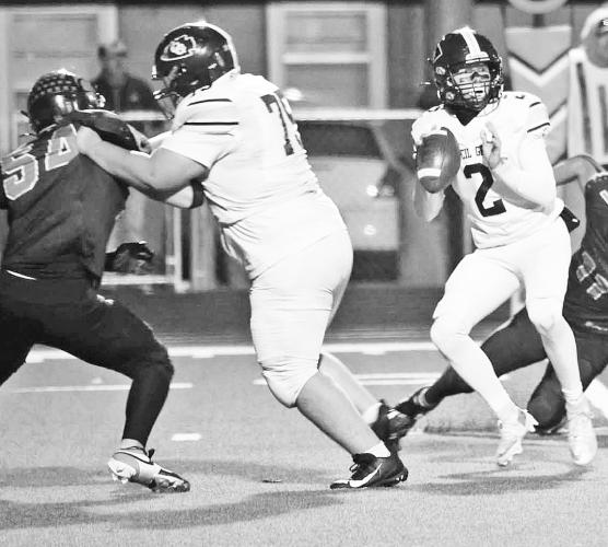 Council Grove Braves quarterback Luke Stewart (#2) had another stellar game Friday, completing 20 of 32 passes for 341 yards and two touchdowns while adding two rushing touchdowns. Photo:Connor Stewart