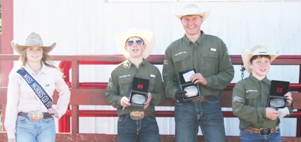 The youth ranch team of C5T took first place at Sunday’s ranch rodeo, sponsored by the Morris County Youth Rodeo Association. Pictured left to right are Miss Morris County Youth Rodeo Queen Macey Bolen, Tip Cloud, Luke Goin and Trace Cloud, all brothers.