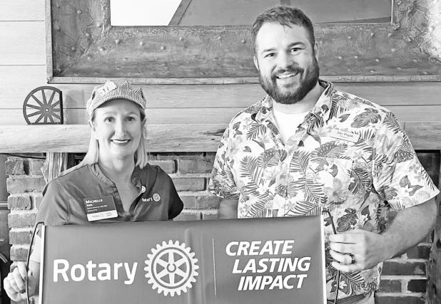 District 5710 Rotary Governor Michelle Sink (left) was in Council Grove Wednesday inspiring the Council Grove Rotary Club to positive impact their community. Pictured with Sink is club president Jake Dugan.