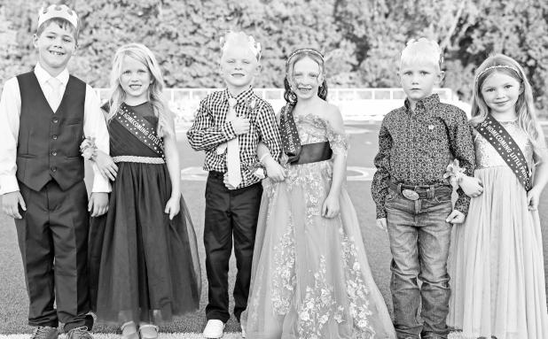 Six local youth served the USD 417 royalty well Friday night. The 2026 Fall Homecoming Little People were (L to R): Knute Fox, Adeline Johnson, Bodhi Green, Everleigh Mount, Mason Green and Kodi Romme. (Photo: Amber Frese)