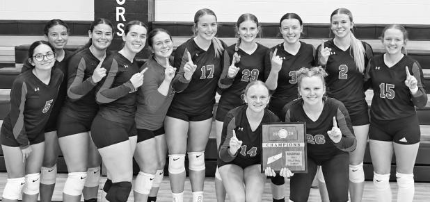 REGIONAL CHAMPIONS — The Chase County Lady Bulldogs celebrate their regional volleyball championship after going undefeated in all three matches and winning all six sets. The team will host substate competition Saturday, Oct. 24. Pictured, from left, are Julianna Rangel, Mena Lincoln, Nora Lincoln, Marcela Bruzon, Vonda Danford, Bella Murphy, Lydia Rains, Ava Wilson, Cora Kohlmeier and Annette Neff. In front are seniors Natalie Neff and Lynnae Rains.