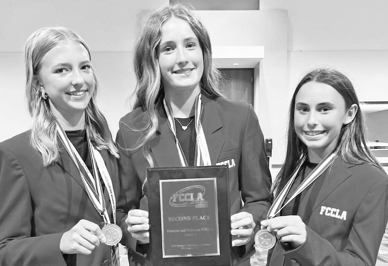 PLACING SECOND IN THE NATION with their project at the national FCCLA awards were USD 417 students (l to r) Madison Forge, Declan SanRomani and Ellie Palmquist.