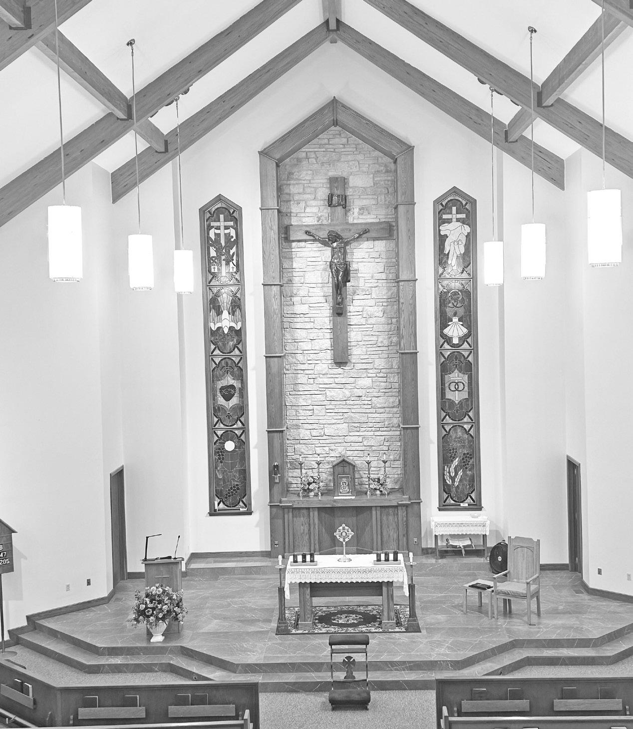 Following flooding of the sanctuary due to broken pipes, the newly renovated St. Rose Catholic Church includes new tile on the altar.