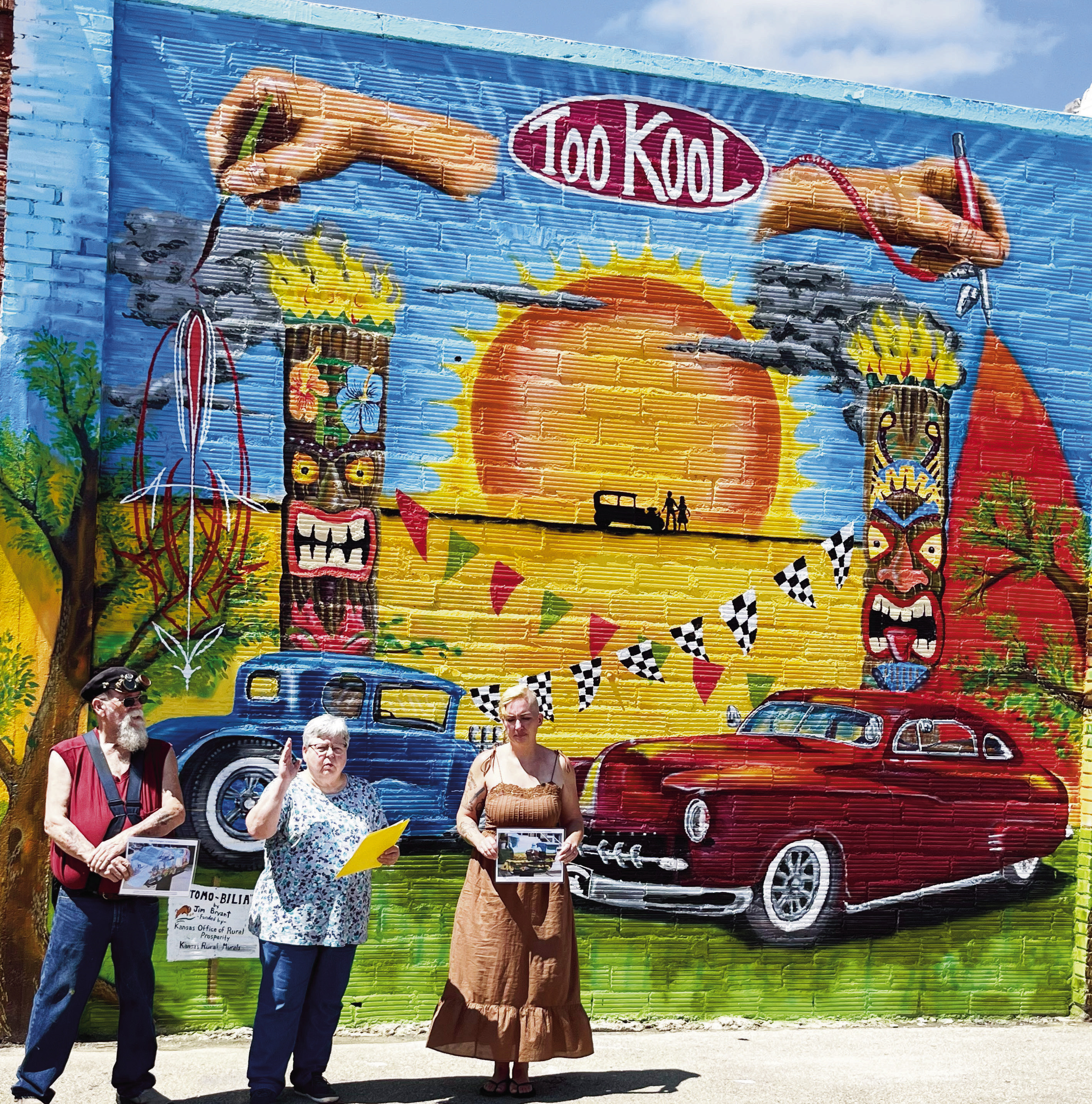 A new mural in Herington was dedicated Saturday afternoon on the east side of the Checkered Flag