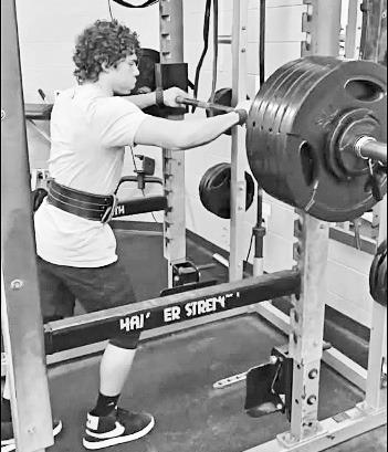 A LOT OF WEIGHT . . . Landon Dody set two records at Chanute, earning 1st place overall. He broke the squat record with 510 lbs and the clean record at 325 lbs.