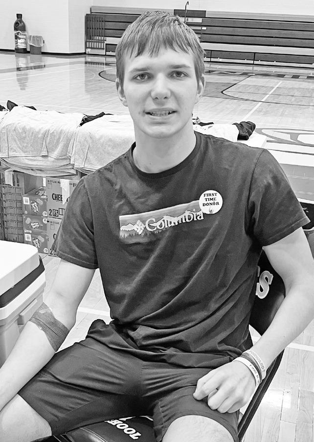 Among first time donors during the Council Grove Junior/Senior High School spring student blood drive on Monday were Jace Schmidt (left) and Matthew Calmes.