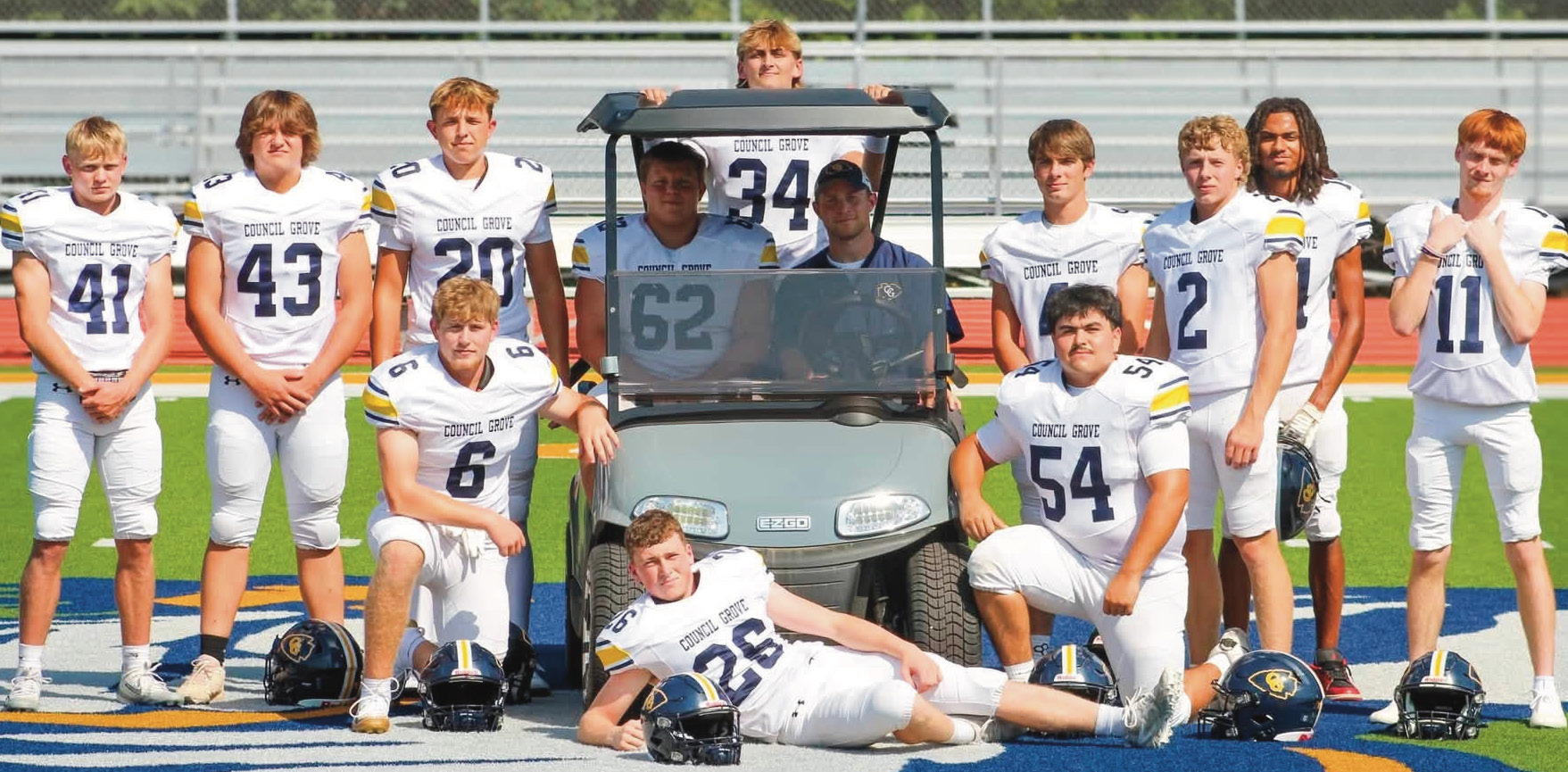 Twelve seniors are in the Council Grove High School Braves football lineup this year. Pictured left to right are: 41 Bradley Doornbos, 43 Mason Bowman, 20 Grady Kepley, 62 Maddox Ziegler, 34 Mason Samuels, Head Coach Derron Reddick, 4 Nate Seimears, 2 Luke Stewart, 14 Sy’ied Smith-Jenkins, 11 Ethan Yowell, 6 Reid Buttrey, 26 David McDiffett and 54 Leo Salas. The Braves open their regular season at home on Friday, Sept. 4, against Mission Valley. (Photo: Keeley Reddick)