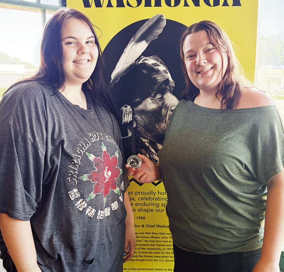 Shawna Davis (left) and Nicole Shepard teamed up to win the first Washunga 2026 button. The second button was located by Hailey Crippen (left in photo #2) and Truu Davis. Many searchers scoured the Riverwalk area without locating the button, which were tucked into the limestone. Washunga 2026 button finders each won a prize package consisting of two Washunga Days Saturday night concert wristbands and two official 2026 Washunga Days T-shirts.