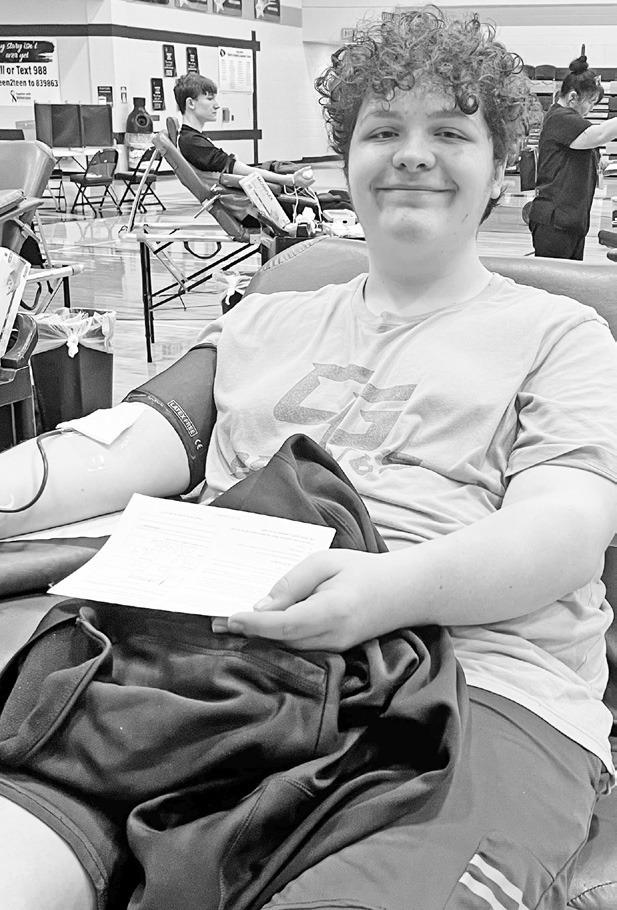 Among first time donors during the Council Grove Junior/Senior High School spring student blood drive on Monday were Jace Schmidt (left) and Matthew Calmes.
