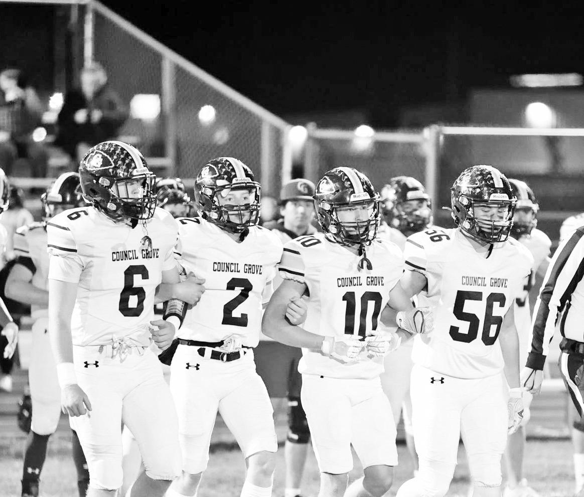 Council Grove Braves captains (left to right) Reid Buttrey, Luke Stewart, Blaise French and Kayden Hewitt led the Braves onto the field Friday night for their regional playoff matchup against Nemaha Central. Despite the loss, the Braves’ unity, resilien