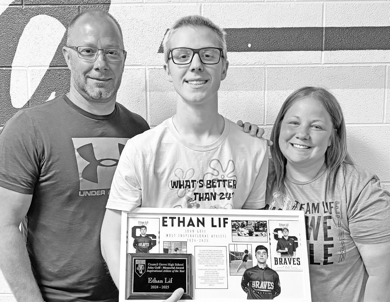 JOHN GOFF AWARD. . .Ethan Lif, pictured with his parents Terry and Amy Lif, received the prestigious John Goff Inspirational Athlete Award. It was named for former Braves Football Coach John Goff who was diagnosed with cancer in the fall of 1970 and led t
