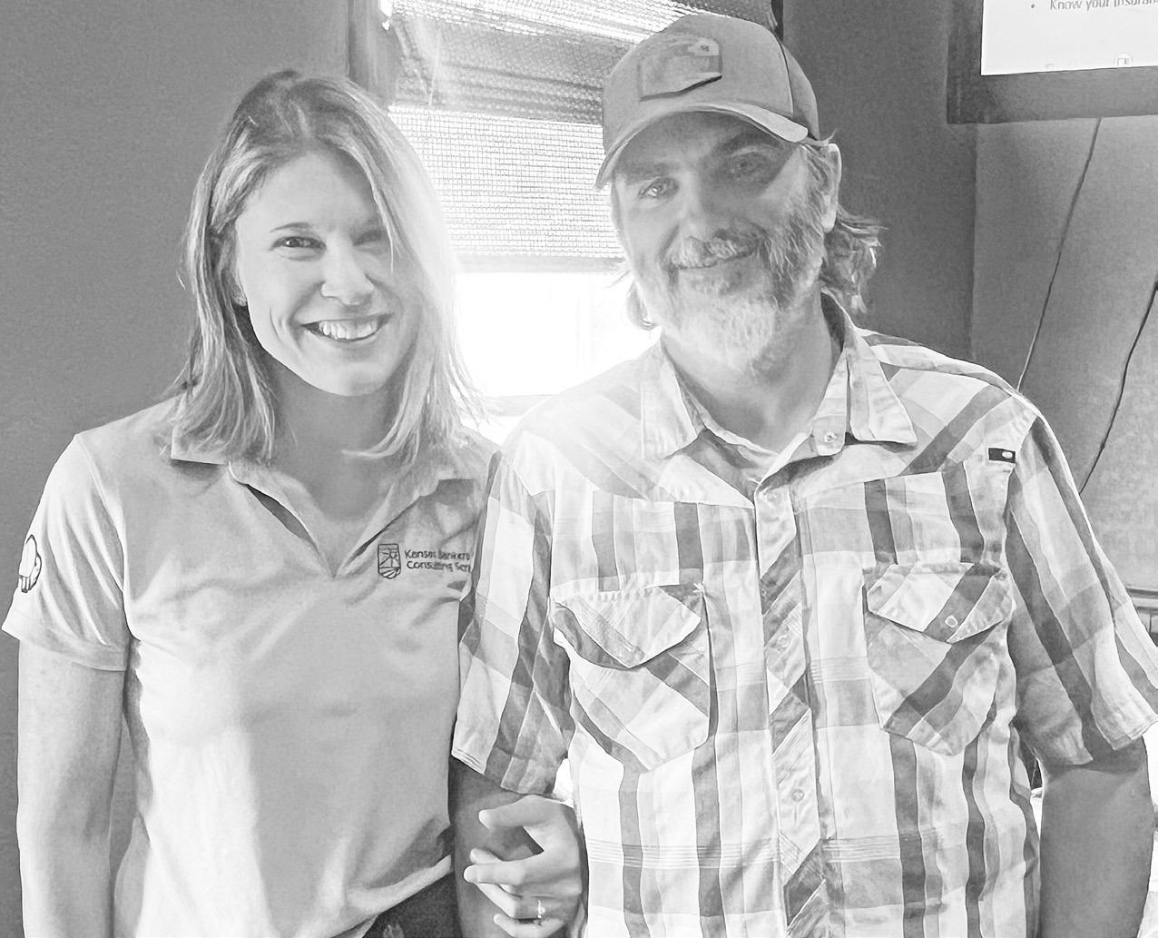 INFORMING ABOUT FINANCIAL FRAUD -- Jamie Cosgrove, JD, SVP-Manager, Legal Department of the Kansas Bankers Association was the guest speaker at the Council Grove Rotary Club Wednesday. She is pictured with her husband Lucas Cosgrove, who is an active memb