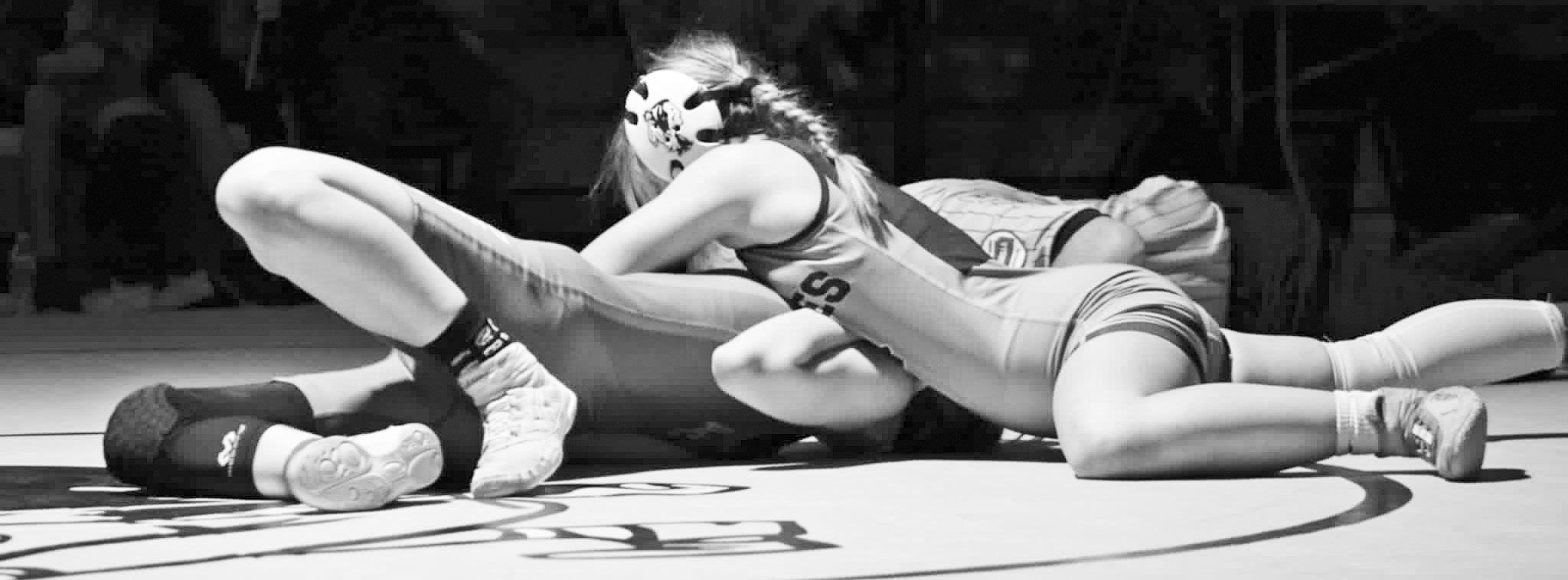 1ST PLACE LADY WRESTLER . . .Khloe Lif pins her opponent in the meet at Fredonia to take first place.