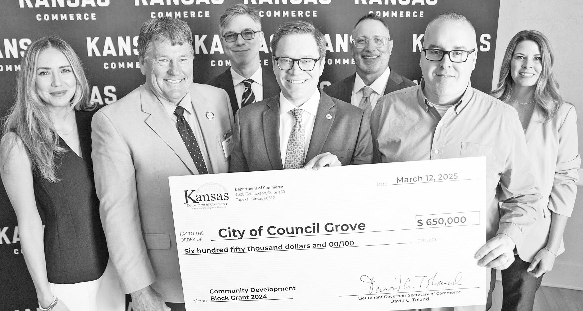 ONE BIG CHECK! . . .The City of Council Grove was awarded a check for $650,000 from a Community Development Block Grant that was applied for in 2024. The CDBG grants are managed through the Kansas Department of Commerce. The funds will be used for the res