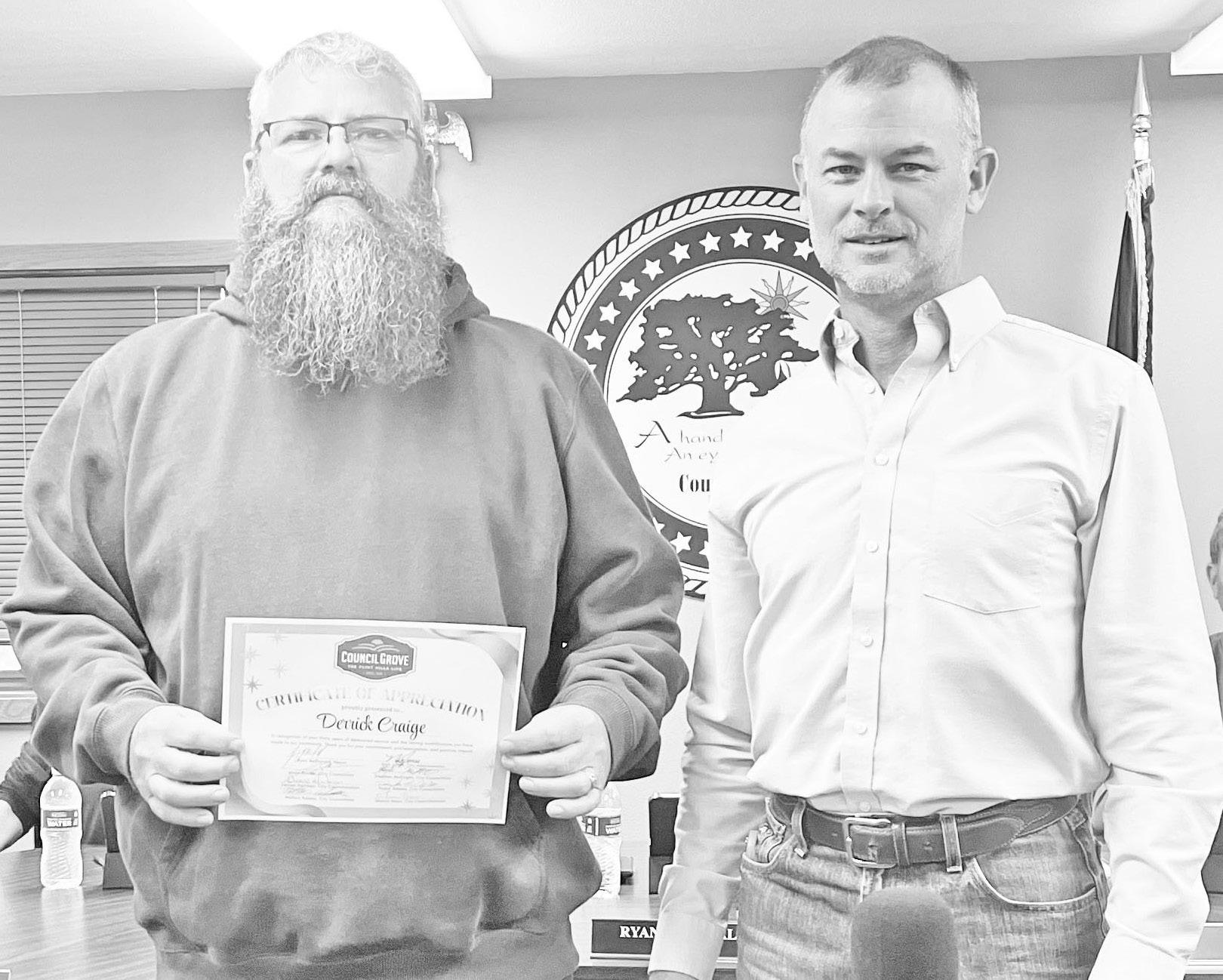 Mayor Ryan McDonald (right), on behalf of the City of Council Grove and the Council Grove City Council, honored Derrick Craige for his 30 years of exemplary service with the city. Employed at the Water Department, Craige is the Utilities Superintendent fo