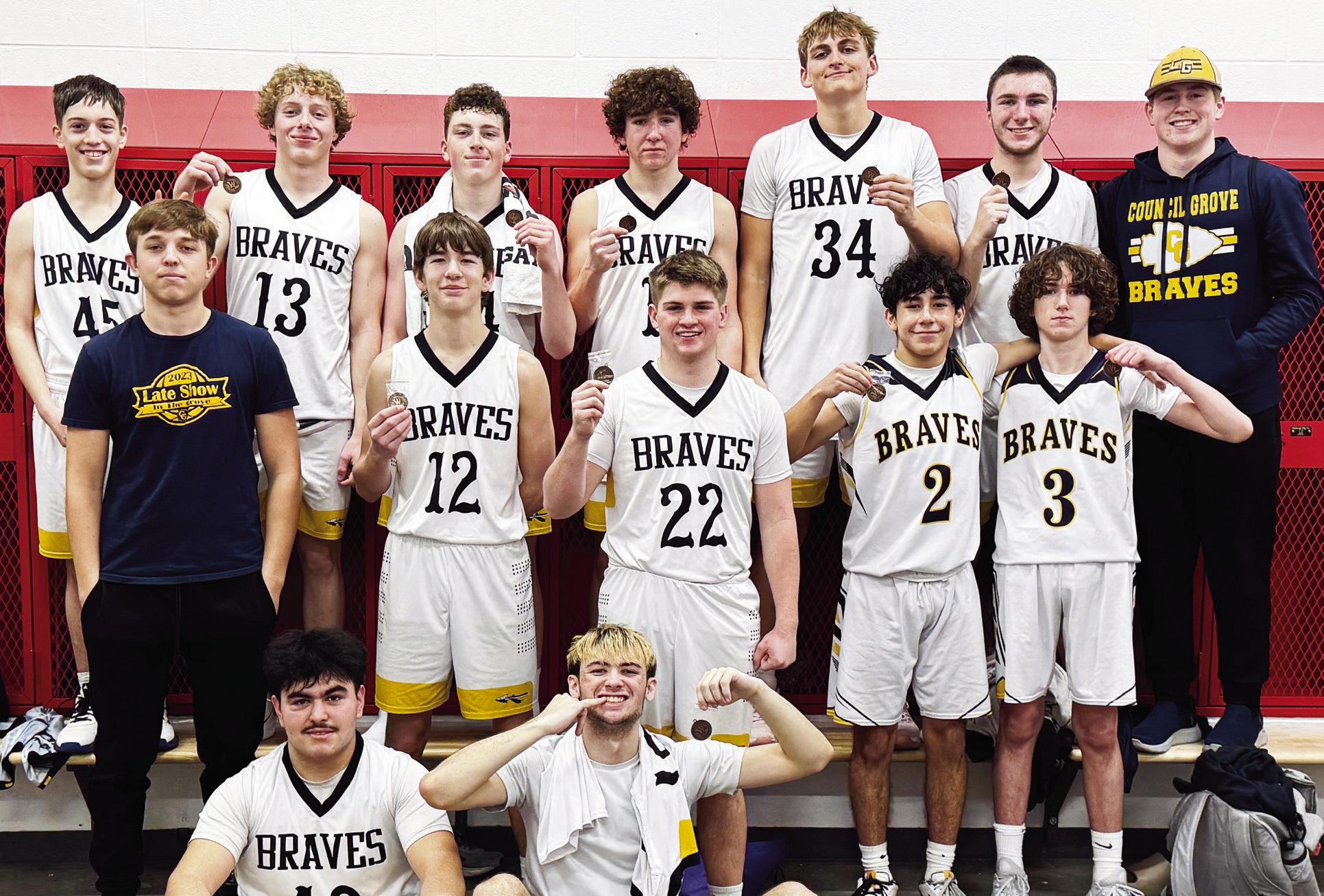 BRAVES C TEAM places 3rd in the Wamego C Team Tourney. Pictured with their medals are top row (L to R): Adein Rice-Kelley, Luke Stewart, David McDiffett, Jadyn Picolet, Mason Samuels, Bryce Azbell and Reid Buttrey (DNP-Student Assistant); middle row: Grad
