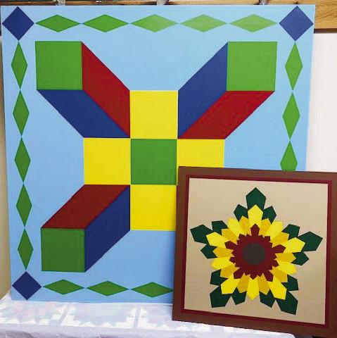 The Barn Quilt Drawing honors Ag Heritage Park Founder Hazel Zimmerman with patterns she painted - Farmer’s Daughter and Sunflower.