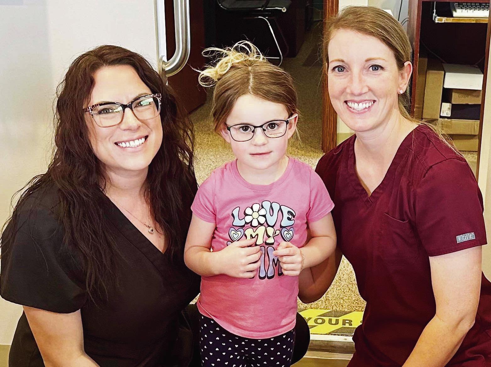 Lyla Messer (center) received excellent care with Buller Eyecare. Pictured with her are Jennifer Bailey (left) and Dr. Jody Buller.