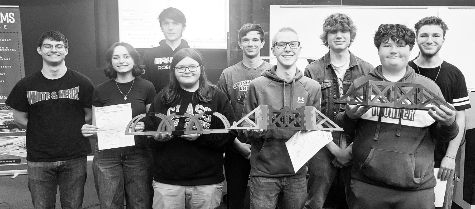 WIN TOP AWARDS . . . 3D printing honors were awarded to nine CGJSHS students at a K-State Bridge Competition on Saturday. Pictured from left to right are back row: Daniel McLaren, Annabelle Balboa, Caleb Schroeder, Elkan Spear, Matthew Lawrence, Bryce Azb