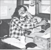IN THE EARLY YEARS -- Eric Nelson, as a young business owner, was captured talking to a client in approximately 1990.