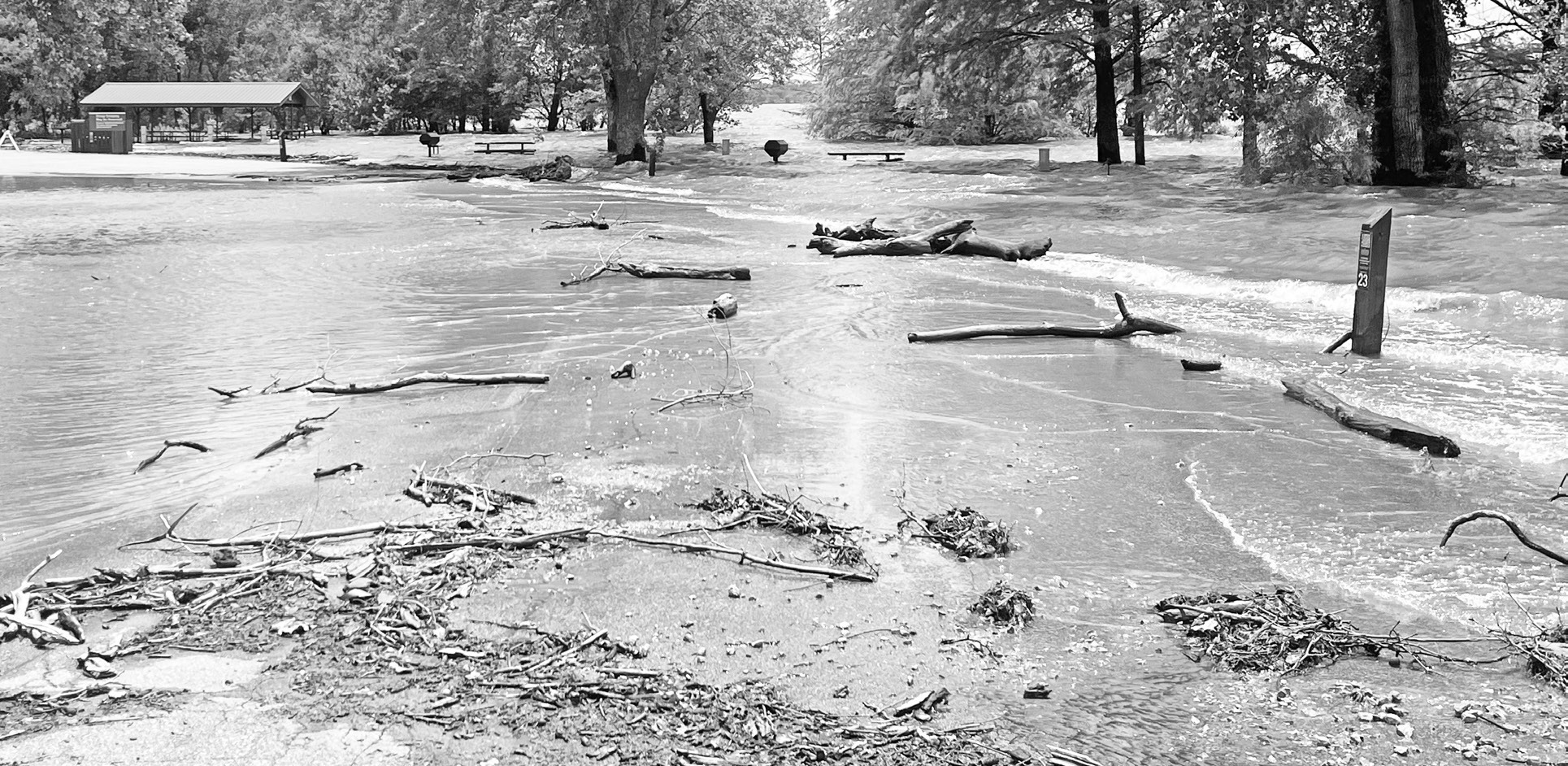 A Monday Council Grove Lake tour showed flooding behind the blockades in Richey Covey. White-capped waves were creating havoc with former picnic sites and young trees. Time will tell how much damage is done to the water-covered road.