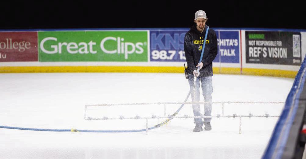 PREPPING THE ICE -- Jaxon Heath, formerly of Council Grove, was applying white paint to the ice at Intrust Bank Arena last week in preparation for the U. S. Figure Skating Championships that are coming to Wichita this week. Photo: Wichita Eagle