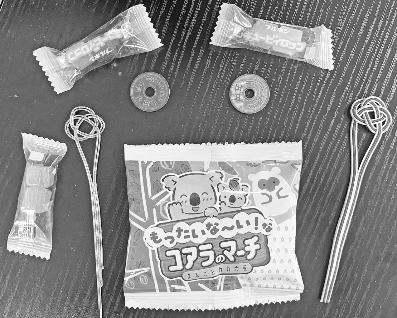 Chaperone/mentor Junko Shimoi blessed the Council Grove Republi-can staff with Japanese candy, bookmarks and coins.