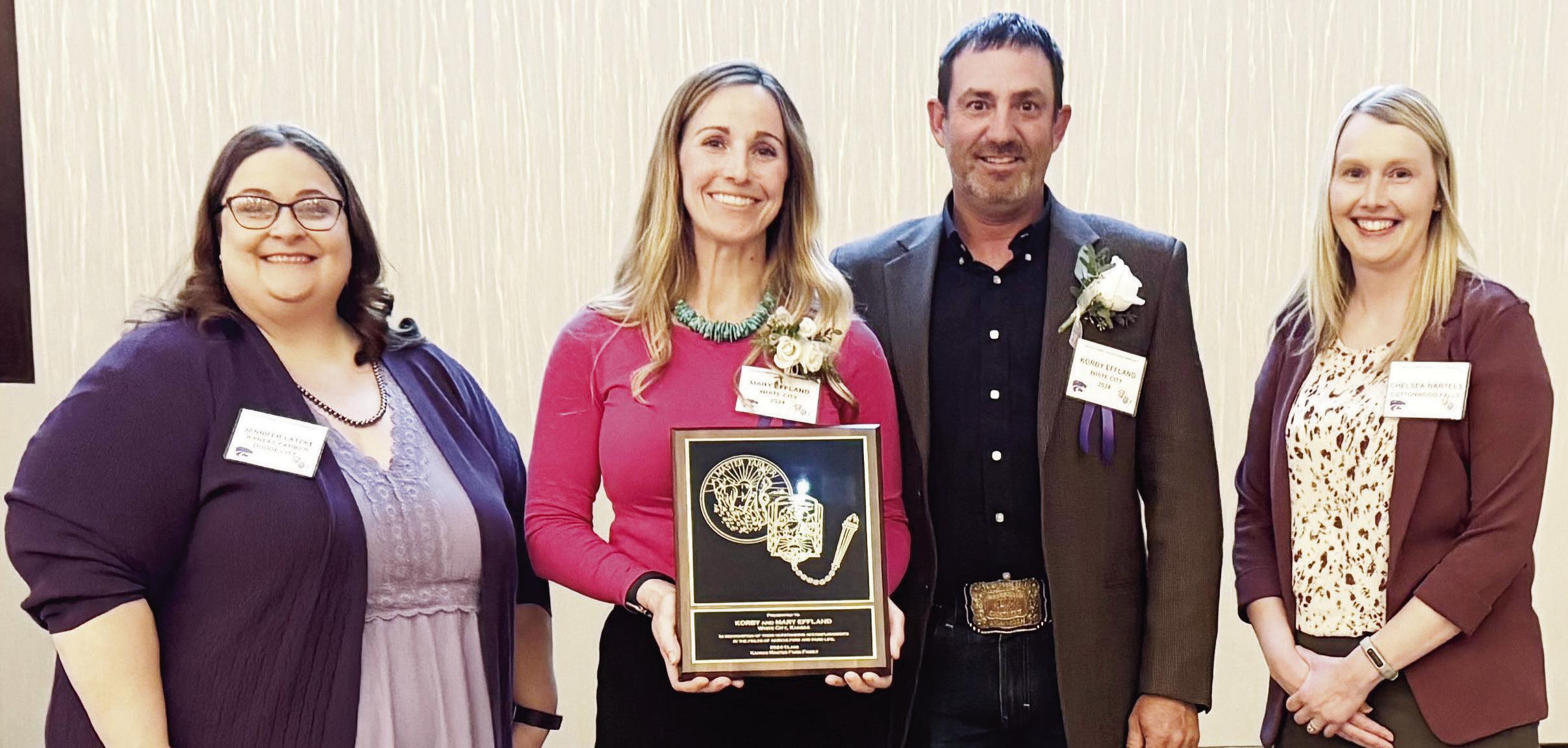 AWARDED MASTER HONORS . . . Korby and Mary Effland of White City were honored on March 21 as members of the 2024 class of Kansas Master Farmers and Master Farm Homemakers. Pictured (l to r) are Jennifer Latzke of Kansas Farm Magazine, Mary Effland, Korby 