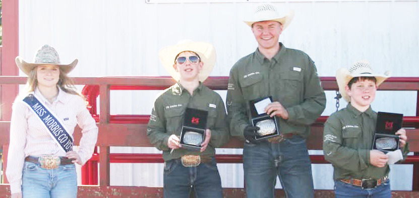 The youth ranch team of C5T took first place at Sunday’s ranch rodeo, sponsored by the Morris County Youth Rodeo Association. Pictured left to right are Miss Morris County Youth Rodeo Queen Macey Bolen, Tip Cloud, Luke Goin and Trace Cloud, all brothers.