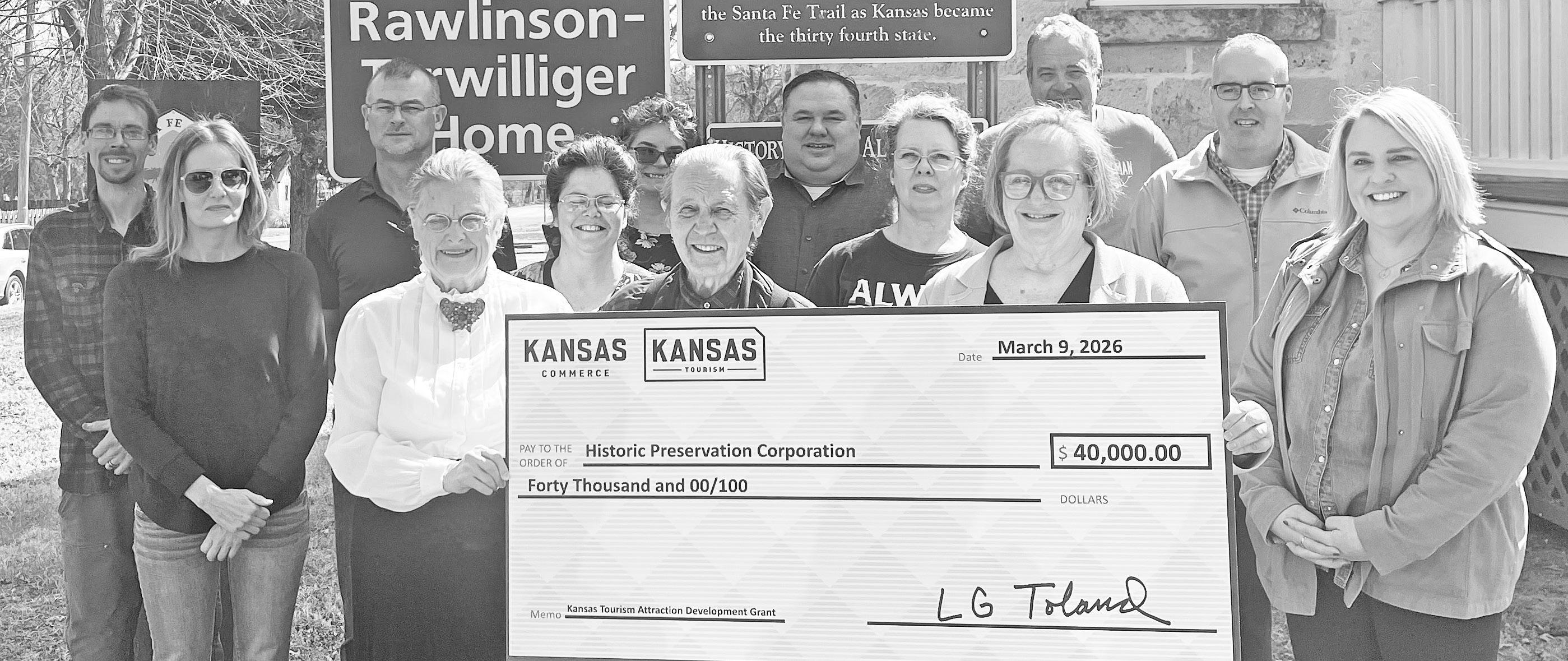 A $40K Kansas Tourism Attraction Development Grant was awarded to the Historic Preservation Corporation on Wednesday, March 18, 2026. On hand to celebrate the occasion with proprietors Shirley and Ken McClintock were (l to r) back row: Jeremy Hilt, Ryan M