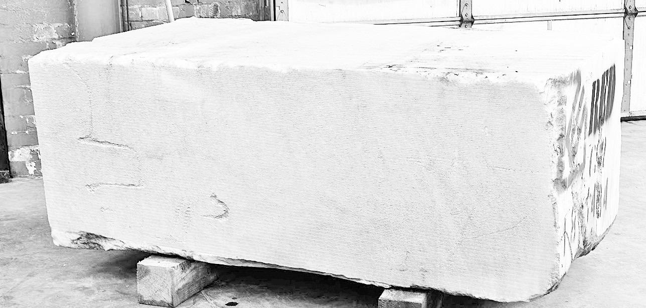 TRANSFORMATION . . . will take place as Martin Cooney Stoneworks creates smaller, lighter-looking works of art from this 3.03 ton white Colorado Yule marble slab.