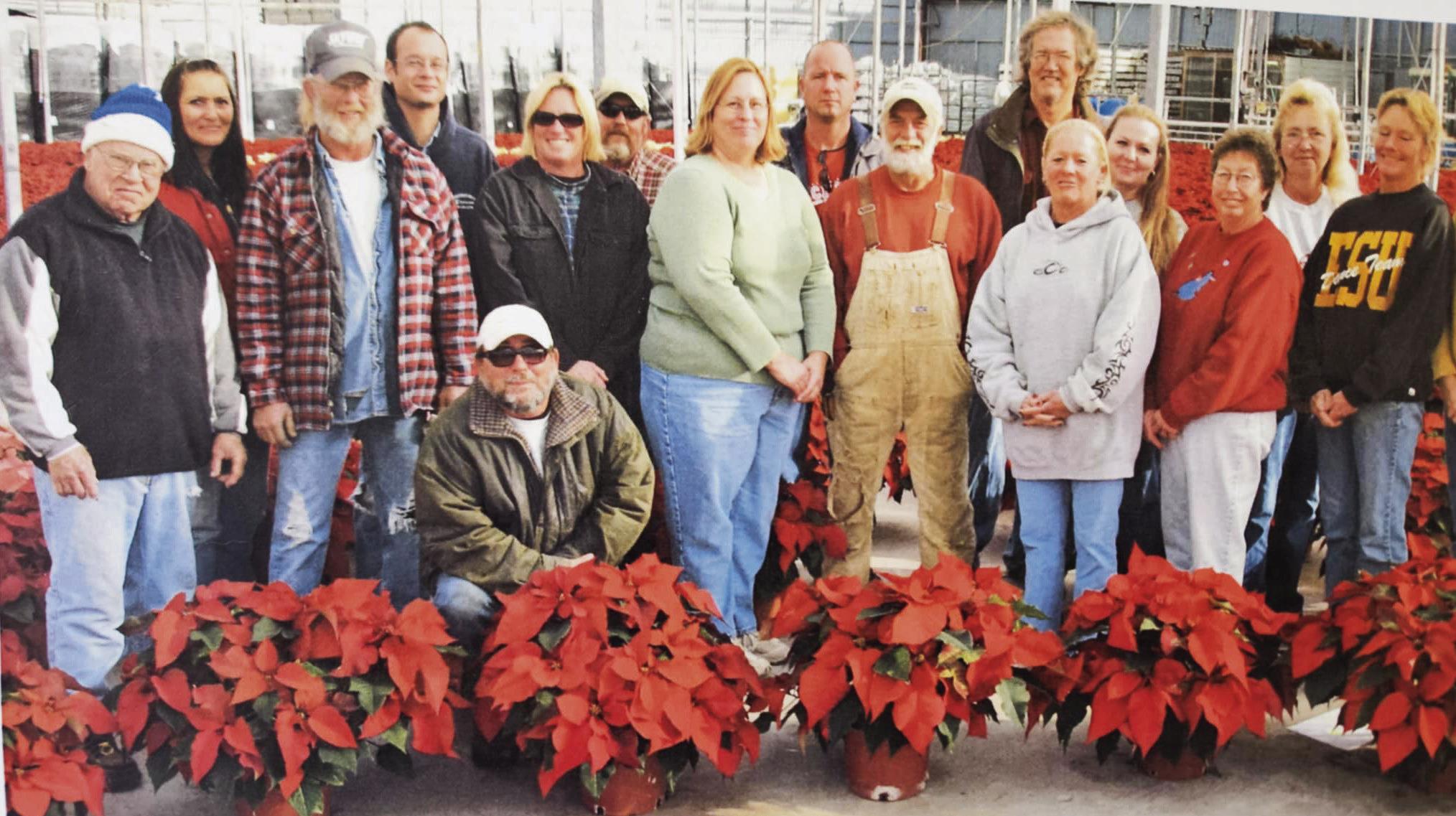 Eric Nelson pictured with some of his dedicated employees from 2008...many who are still with him today. Nelson has been able to attract skilled workers and retain them which contributes to the overall success of Neosho Gardens.