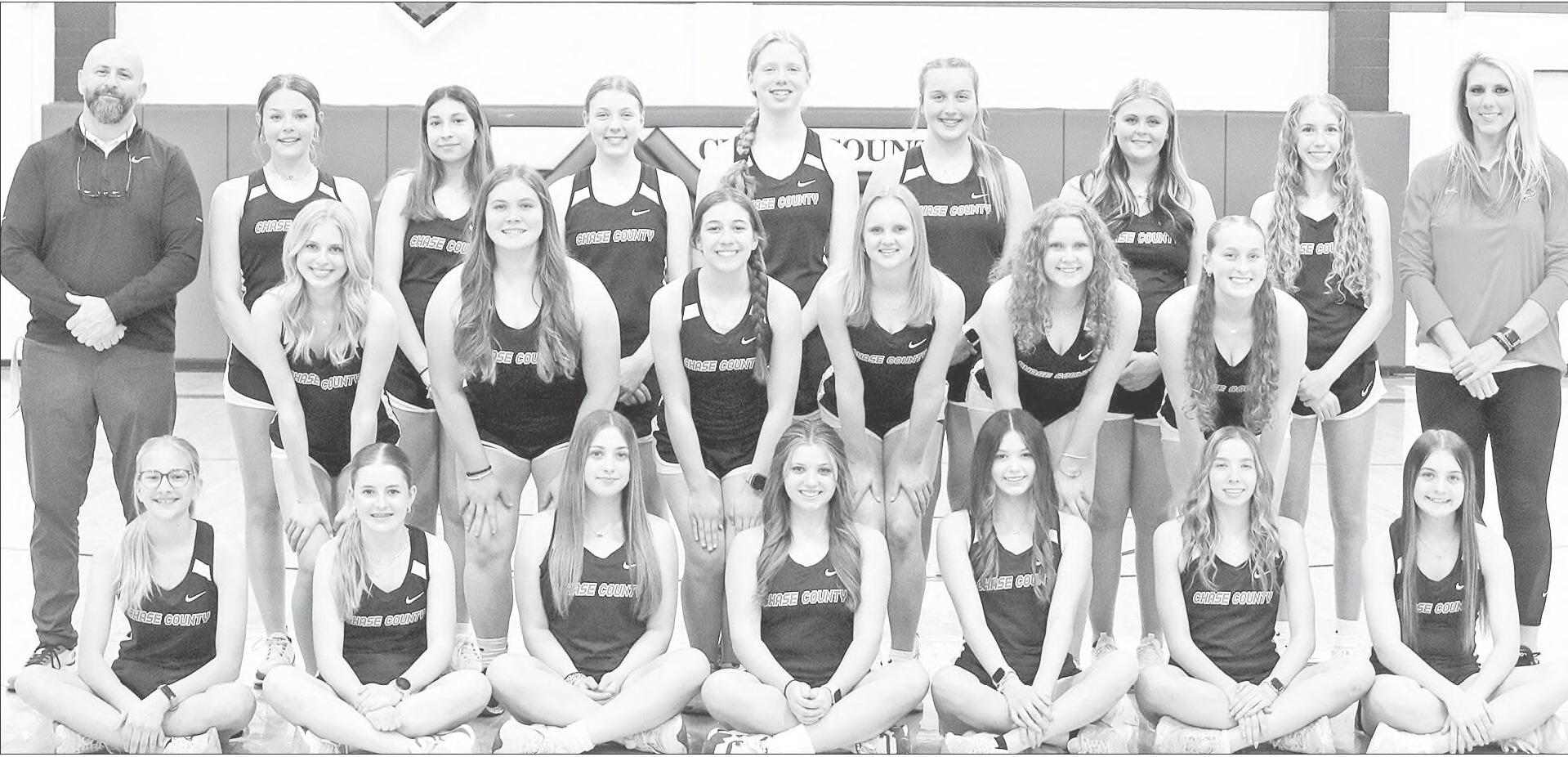POISED FOR A BIG SEASON ... The Chase County Lady Bulldogs are laced up and ready for a great track and field season. Pictured left to right, back row: Coach Derick Budke, Lola Vogel, Story Moss, Ava Wilson, Madelyn Wilson, Bella Murphy, Dana Maddox, Kiya