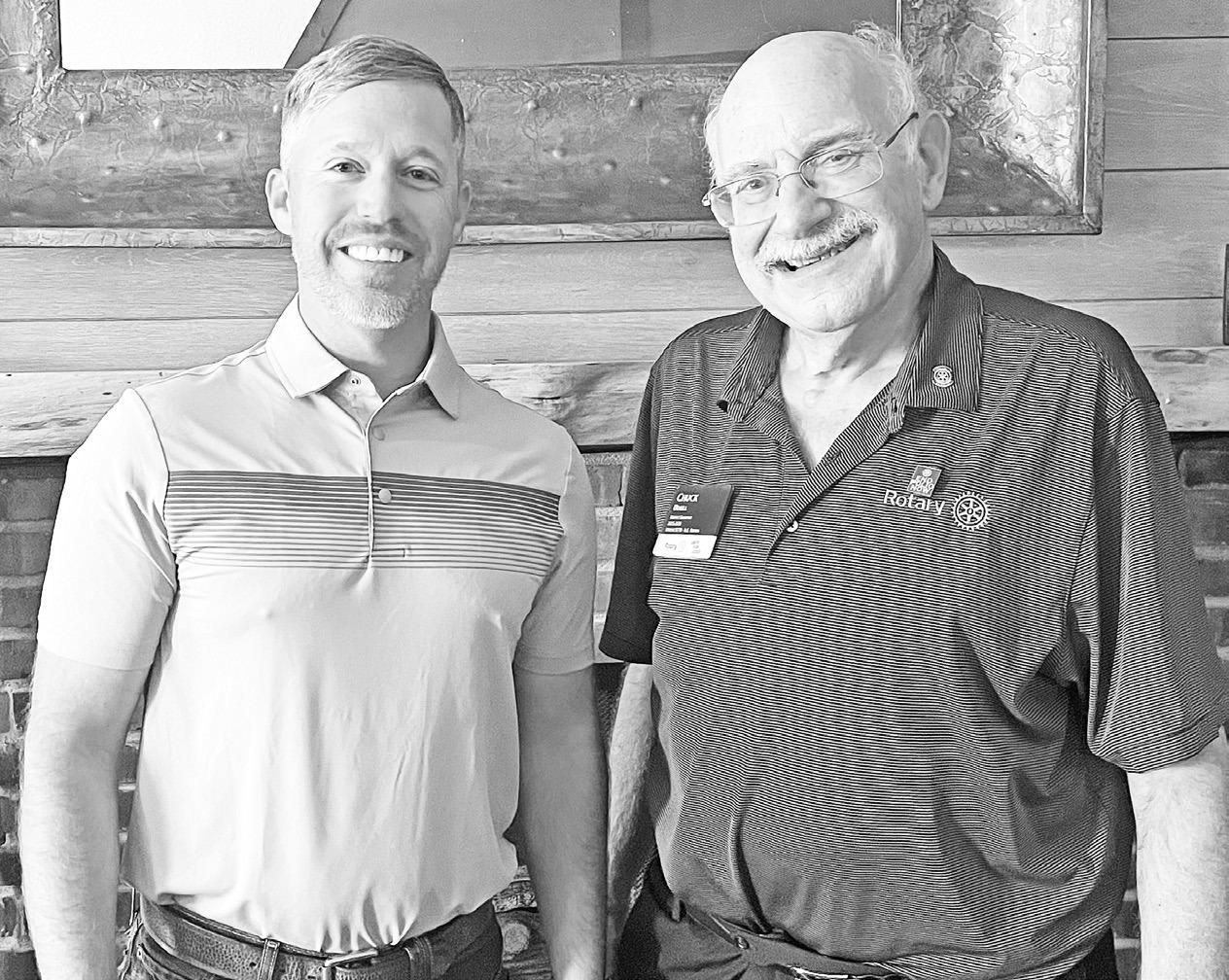 DISTRICT GOVERNOR VISITS ROTARY -- Council Grove Rotary President Trent Siegle (left) welcomed Rotary District Governor Chuck Udell, of Leawood, Kansas, as a guest at Wednesday’s weekly meeting. Udell is District Governor for Rotary District 5710, which