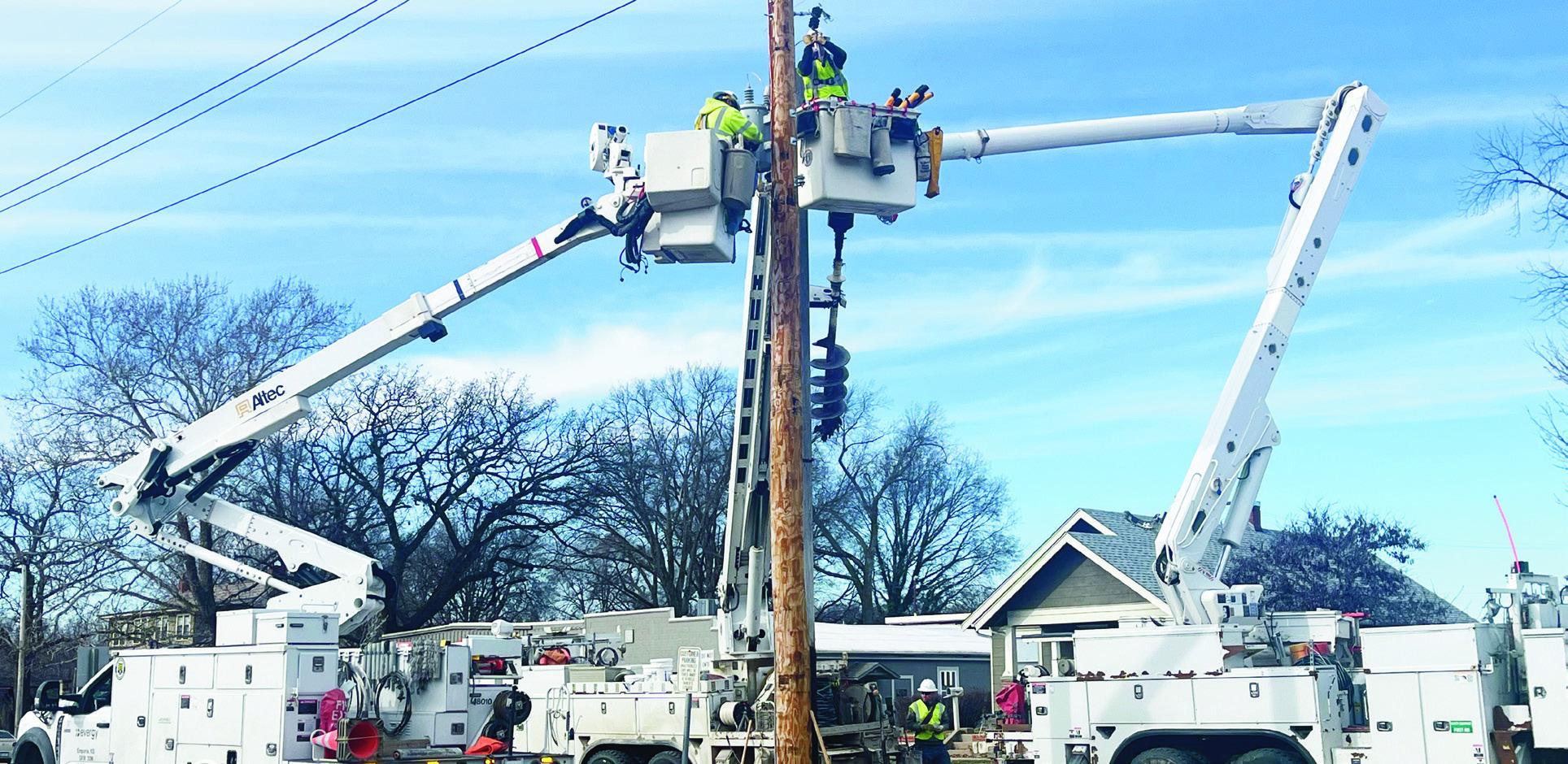 Evergy crews were busy Tuesday prepping a site adjacent to Ray’s Apple Market with power needs to supply a three bay Tesla Destination Charging Station that is nearing completion. A charging station (right) will be visible on the Tesla Destination maps,