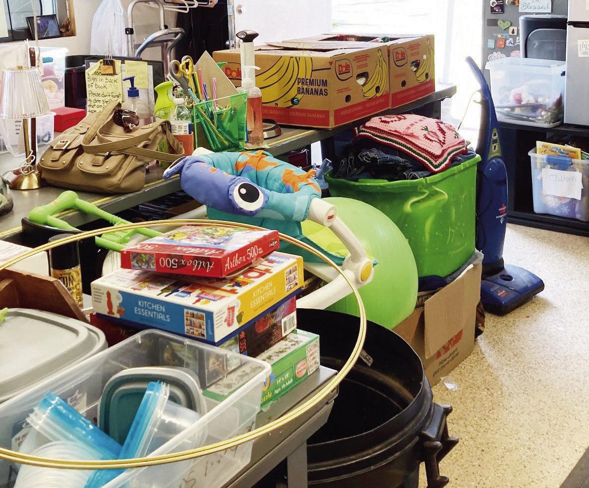 COMMUNITY DONATIONS consisting of bags, boxes and bins were left at the Community Thrift Store after the citywide garage sales during the weekend.