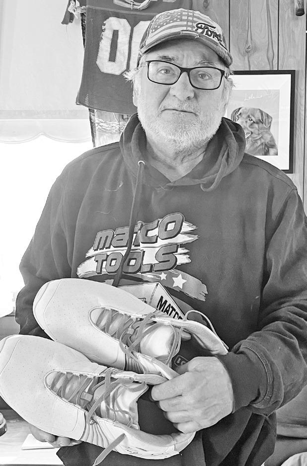 Herington resident Jeff Siegrist was recently presented with a pair of symbolic “big shoes” by the Council Grove Republican in recognition of his more than 10 years of faithfully delivering newspapers for Herington subscribers to the Herington Post Of