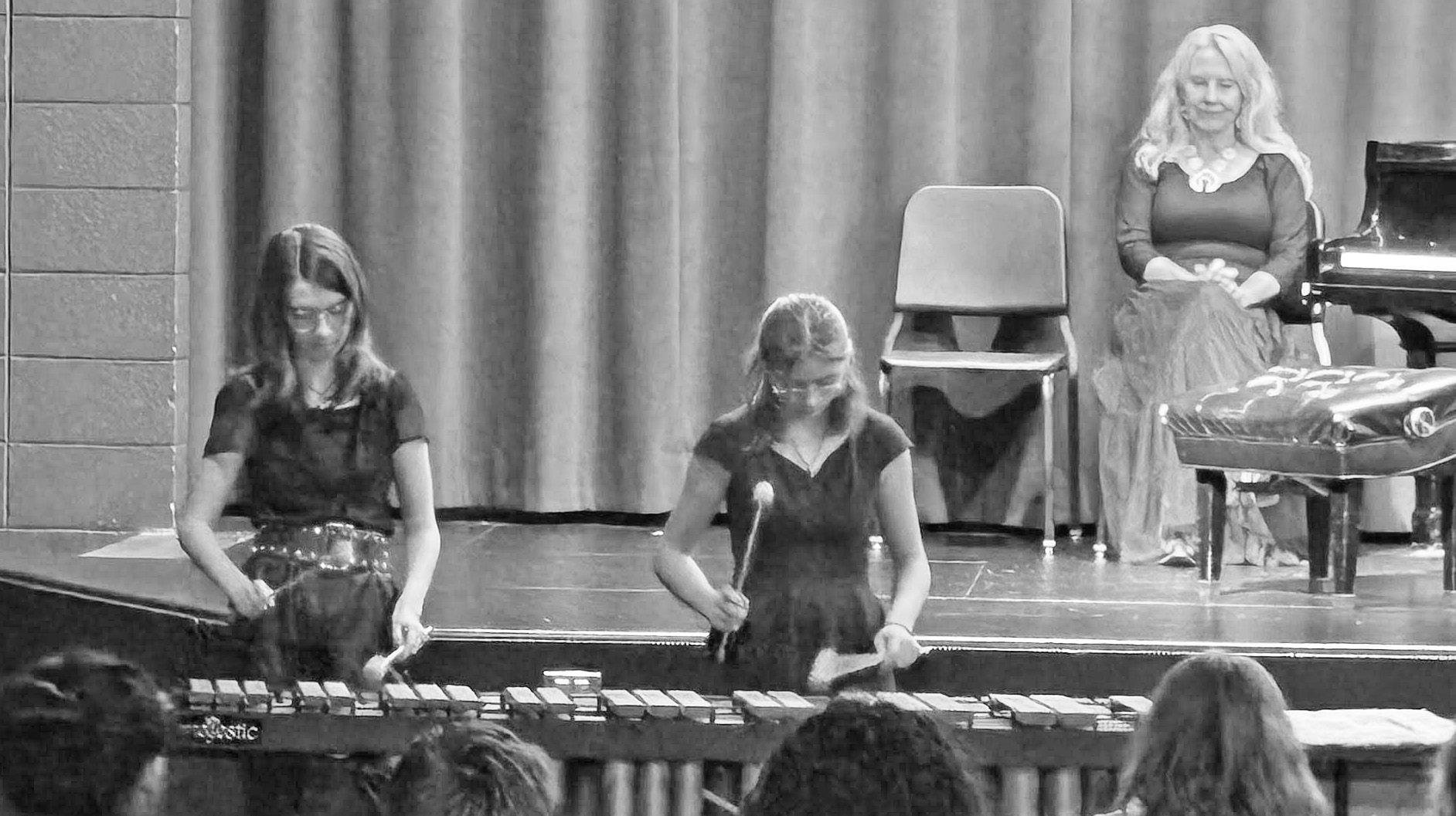CGJSHS percussion members Ayla Schweger and Harlie Falder performed at the recent concert. Sheila Litke, on stage, served as an accompanist during the concert.