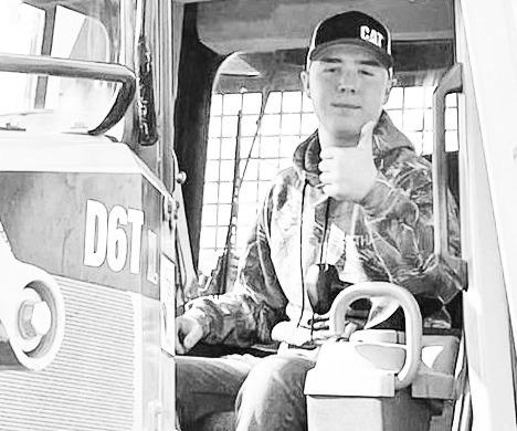 CAT CONNECTION . . . Local youth Ethan Lif was honored by Foley Equipment with a website article about his passion with Caterpillar equipment, while battling osteosarcoma, a type of cancer.