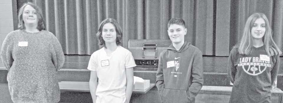 CGJH SPELLING WINNERS -- Kovin Payton, eighth grader, was the Council Grove Junior High spelling bee champion when the event was held Wednesday. Winners pictured are (L to R): Hannelore LaRue, third place; Payton, first place; Aaron Crotts, fourth place; and Maya Mulryan, second place.