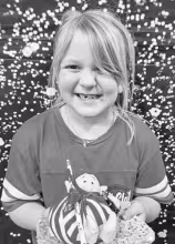 Audrey Wessel-Carson is seven years old and a student in Myah Frick’s second grade class. Her favorite color is pink. Audrey says if she had one superpower it would be to fly because she wouldn’t have to walk to the bus stop. The best present she has 