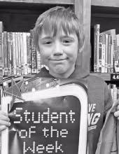 Jase Johnson, 3rd grade, demonstrated responsible behavior by helping clean up toys at recess.