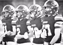 The Council Grove Braves exhibited discipline, confidence and execution Friday night, beating the West Franklin Falcons 66-0. Amber Weeks captured this look of determination in the team’s captains earlier in the night. Pictured left to right are: Bradley Doornbos, Luke Stewart, David McDiffet and Reid Buttrey. Full article on page 4.
