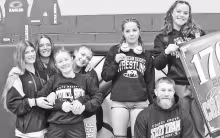 STATE BOUND -- Council Grove and Northern Heights High Schools had six girls qualify for the 321A State Wrestling Tournament that will be February 27 and 28 in Hays. Those qualifying and pictured with their coach Brogan Humphrey are - (L to R): Savannah S