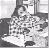 IN THE EARLY YEARS -- Eric Nelson, as a young business owner, was captured talking to a client in approximately 1990.