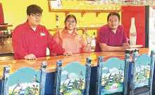 La Isla Authentic Mexican Restaurant and Cantina, in Herington, is family-owned and prides itself on delicious authentic food. Pictured at the bar are brother Adan Carvajal (left), sister daughter Lorena Carvajal and father Adan Ramirez. Note the colorful